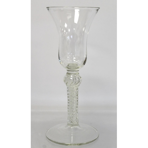 209 - Antique drinking glass, the bell shaped bowl on knopped air twist straight stem and domed circular f... 