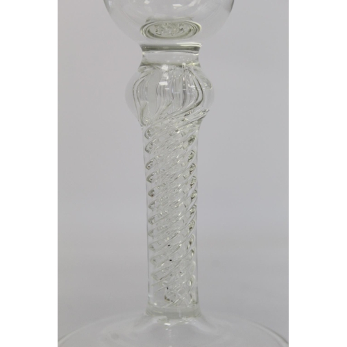 209 - Antique drinking glass, the bell shaped bowl on knopped air twist straight stem and domed circular f... 