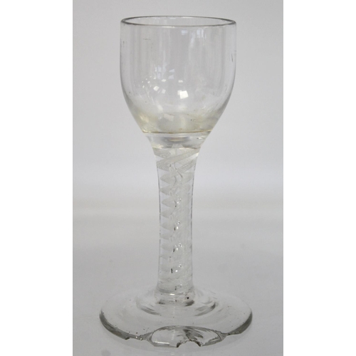 209 - Antique drinking glass, the bell shaped bowl on knopped air twist straight stem and domed circular f... 