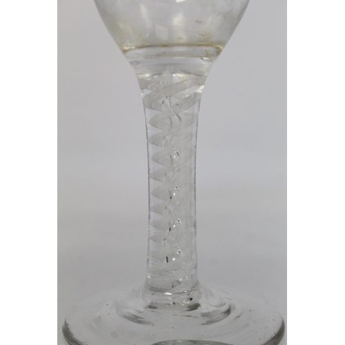 209 - Antique drinking glass, the bell shaped bowl on knopped air twist straight stem and domed circular f... 