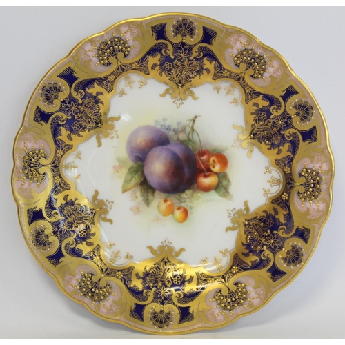 216 - Three Royal Worcester porcelain dessert plates of lobed circular form with hand painted central pane... 