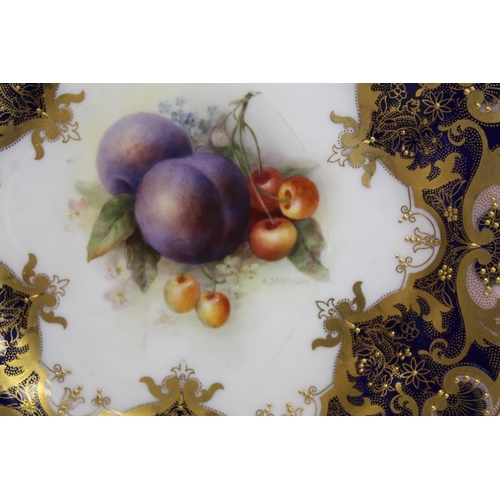 216 - Three Royal Worcester porcelain dessert plates of lobed circular form with hand painted central pane... 