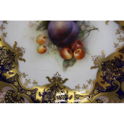 216 - Three Royal Worcester porcelain dessert plates of lobed circular form with hand painted central pane... 