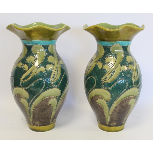 229 - Pair of Burmantofts art pottery vases of baluster form with lobed flared rims and scrolling sgraffit... 