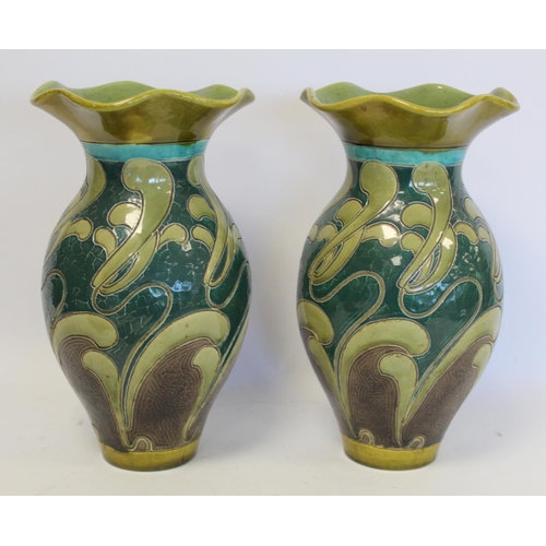 229 - Pair of Burmantofts art pottery vases of baluster form with lobed flared rims and scrolling sgraffit... 