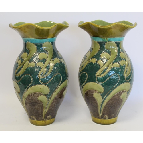 229 - Pair of Burmantofts art pottery vases of baluster form with lobed flared rims and scrolling sgraffit... 