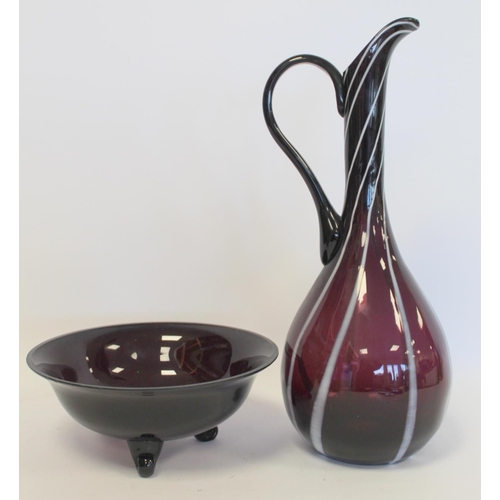 232 - Amethyst art glass ewer of slender form with white striations, snapped pontil mark, 37cm high; also ... 