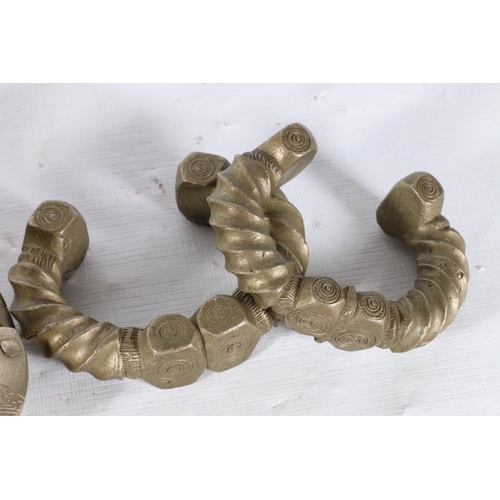 25 - Pair of white metal Indian shackles and a pair of Indian bangles