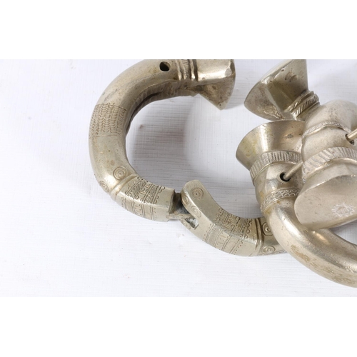 25 - Pair of white metal Indian shackles and a pair of Indian bangles