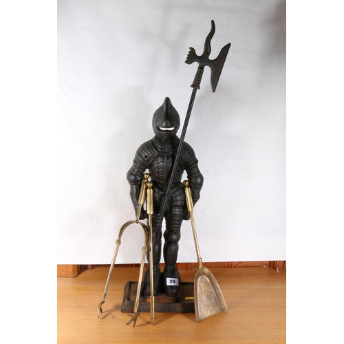 29 - Harlequin companion set, holder formed as a knight in armour with axe, 70cm.