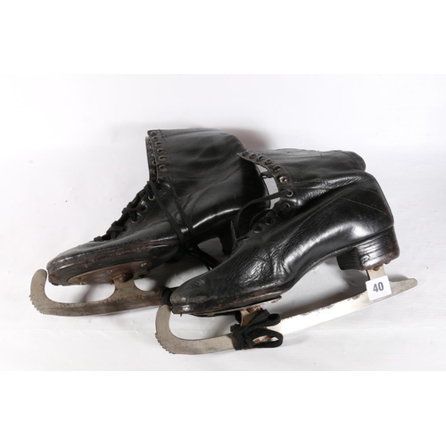 40 - Pair of vintage ice skates by Aviso.