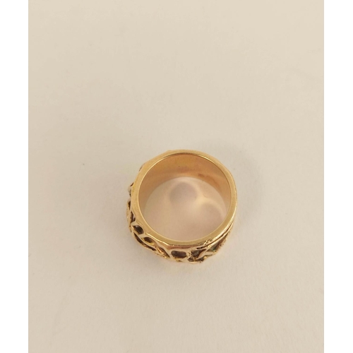 69 - Gold ring of twiggy openwork form upon matting, probably 9ct, size 'N½', 9.5g.