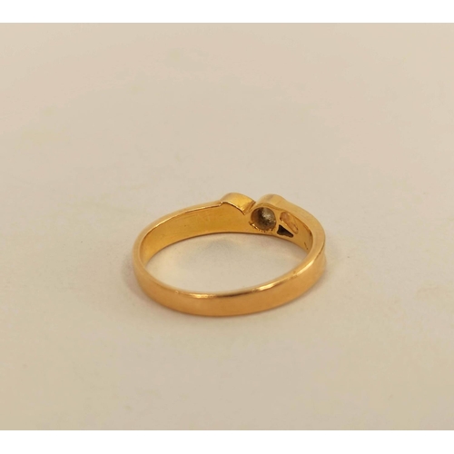 70 - Diamond solitaire ring, collet set, upon ribbing, probably 18ct gold, size 'O', 8g.