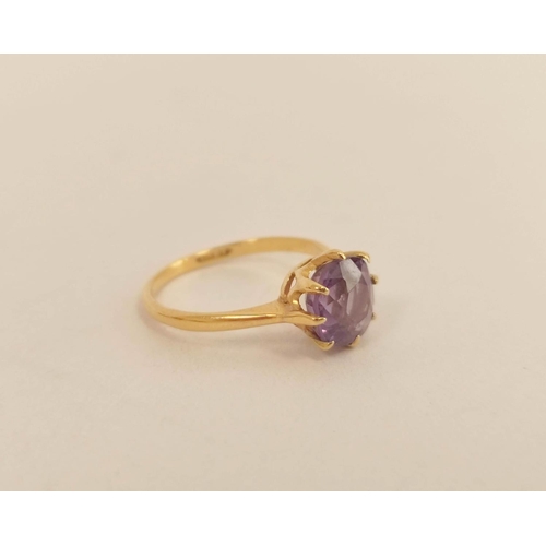 99 - Purple sapphire ring in gold, 18ct and another on 22ct gold shank. 4.7g