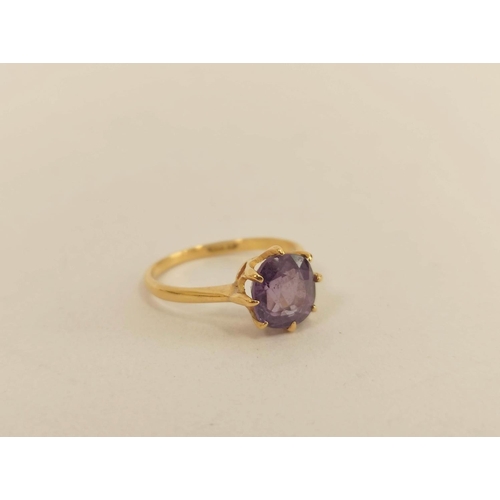 99 - Purple sapphire ring in gold, 18ct and another on 22ct gold shank. 4.7g