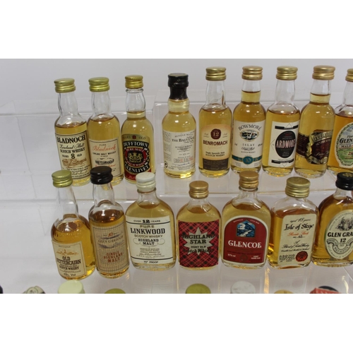 183 - Collection of thirty five Scotch Whisky miniatures, mainly single malts, each 5cl.  (35).