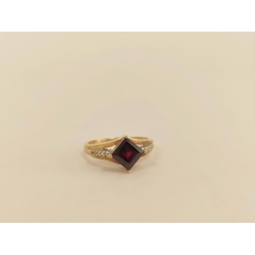 61 - Red spinel ring, another with square garnet and a citrine three stone ring, all 9ct gold. (3). 12.6g