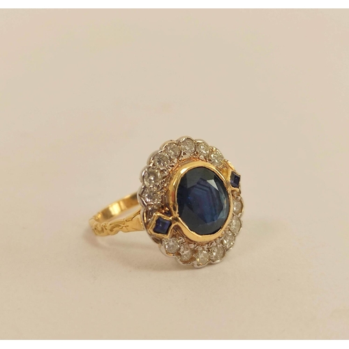 63 - Cluster ring of Victorian style, with an oval sapphire flanked by two others, square, within fourtee... 