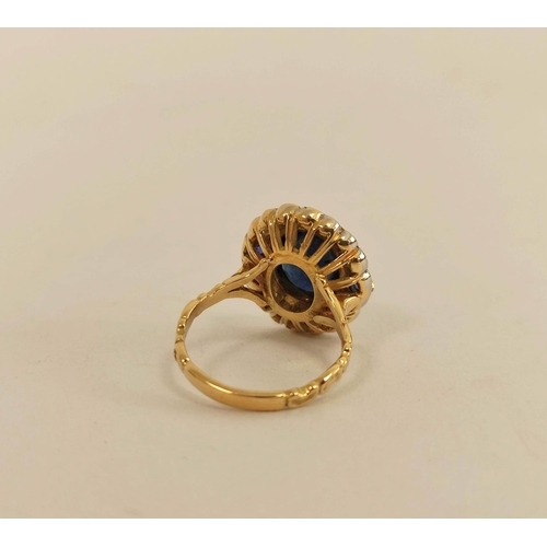 63 - Cluster ring of Victorian style, with an oval sapphire flanked by two others, square, within fourtee... 