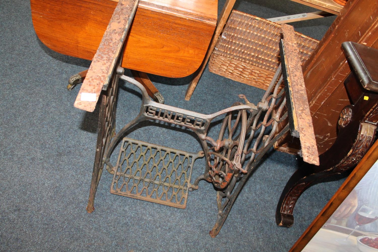 Singer sewing machine wrought iron base.