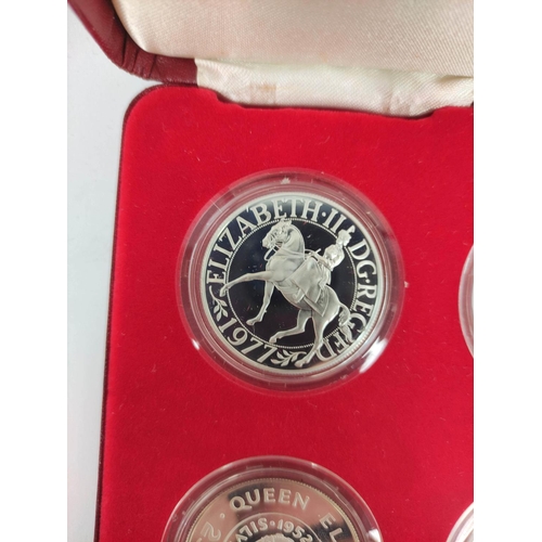 110 - United Kingdom. 1977 silver jubilee Spink's silver crown eight coin set. Complete with box and paper... 