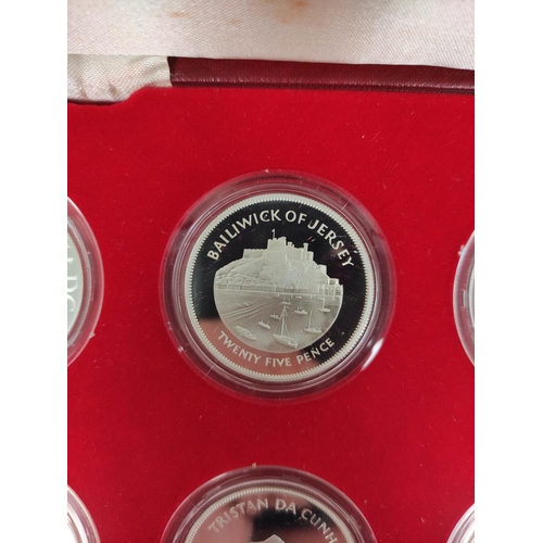 110 - United Kingdom. 1977 silver jubilee Spink's silver crown eight coin set. Complete with box and paper... 