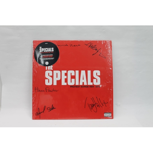 352 - The Specials Protest Songs 1924-2012 signed front sleeve.