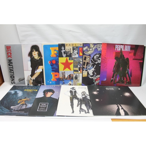 356 - Collection of new pressing albums to include Joan Jett Bad Reputation, Beck Mutation vinyl, poster a... 