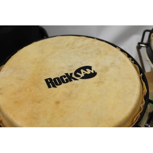 251 - Pair of Rock Jam bongos in zip case.