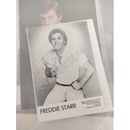 237 - Folder containing a collection of celebrity autographs to include Freddie Starr, Shanon Gless, Sandy... 