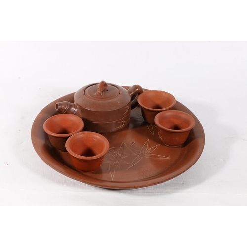 53 - Chinese Yixing Saki set on tray, 23cm diameter.