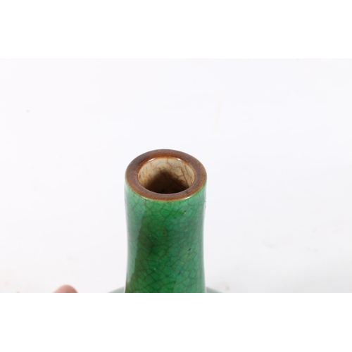 56 - Oriental green ground crackleware bottle vase, 15cm.