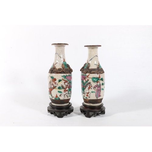 58 - Pair of oriental crackle ware vases on stands, 18cm.