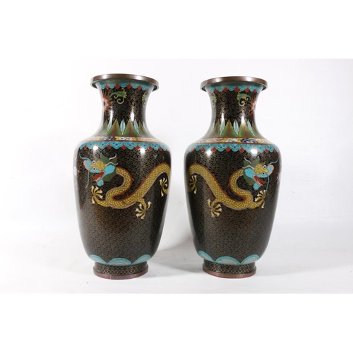 60 - Pair of Chinese cloisonne dragon decorated vases, 26cm.