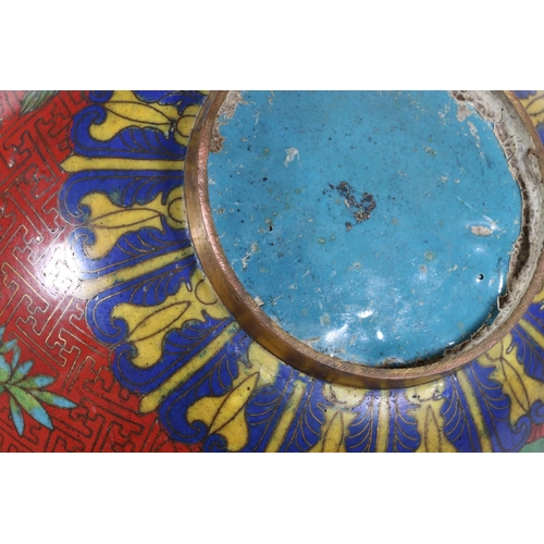 65 - Chinese cloisonne jar and cover decorated with flowers on red ground, 20cm.