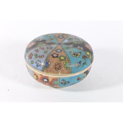 67 - Oriental ceramic jar and cover with cloisonne style decoration, 13cm diameter.