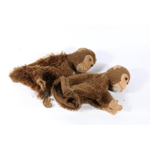 27 - Two antique monkey hand puppets.