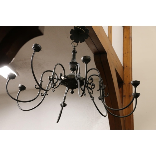 821 - Metal eight branch chandelier.