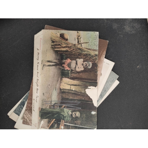 203 - Bag containing over 100 early 20th century postcards mostly of egyptian, Indian & middle eastern... 