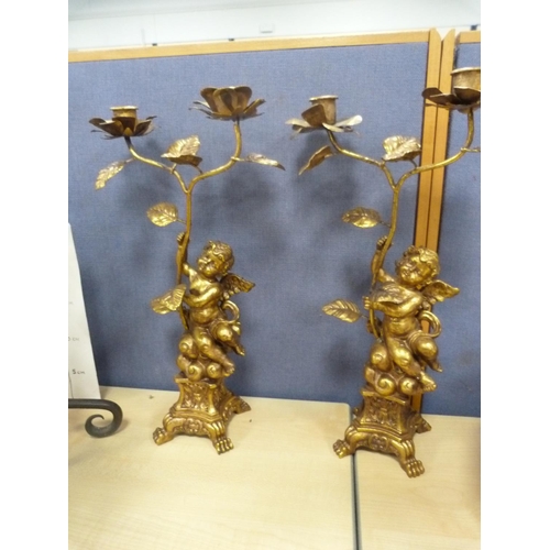 11 - Two-sconce candelabrum decorated with putti, vase on a wrought iron stand, wrought candle sconce, oi... 