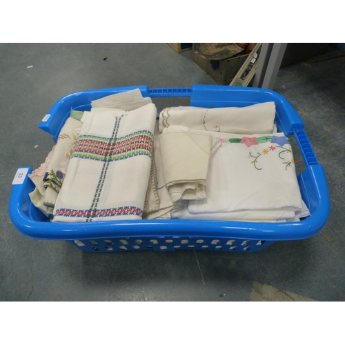 23 - Tub containing assorted linen to include tablecloths etc.