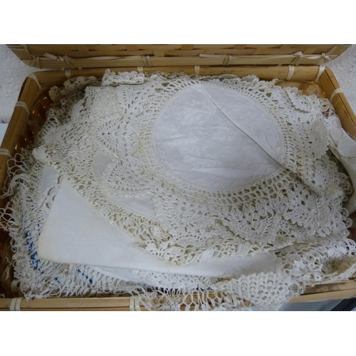 49 - Small box containing linen to include doilies etc., also a bird stand on a metal base.