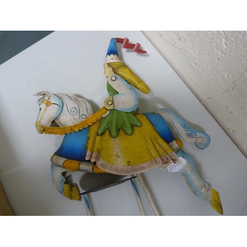 52 - Continental painted metal toy of a lady on horseback.
