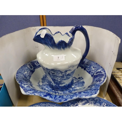 7 - Staffordshire-style blue and white ceramic toilet jug and basin, blue and white plates and a blue an... 