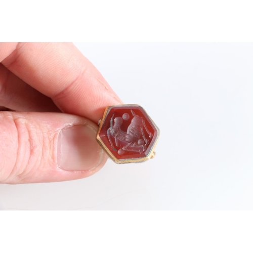 194 - Roman style intaglio seal ring set with carnelian depicting horse, size R, 8.4grams.