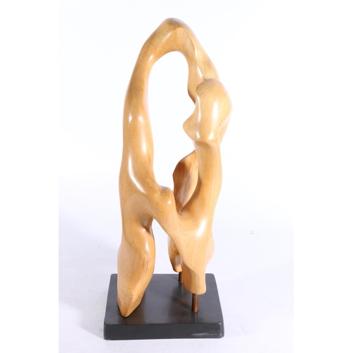 407 - PIPER, a 20th century carved root wood sculpture of abstract form, incised signature 'Piper', raised... 