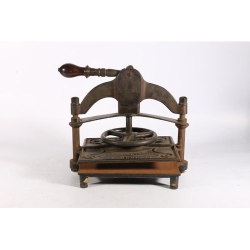 410 - Patrick Ritchie of Edinburgh cast metal lever action book press, 35cm wide. 