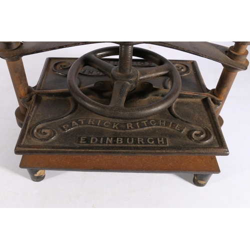 410 - Patrick Ritchie of Edinburgh cast metal lever action book press, 35cm wide. 