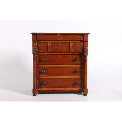 414 - Victorian mahogany apprentice chest of drawers, the breakfront top above secret frieze drawer over l... 