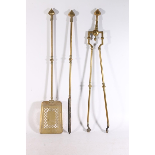 421 - Set of three Victorian brass fire irons, the shovel 76cm long. 